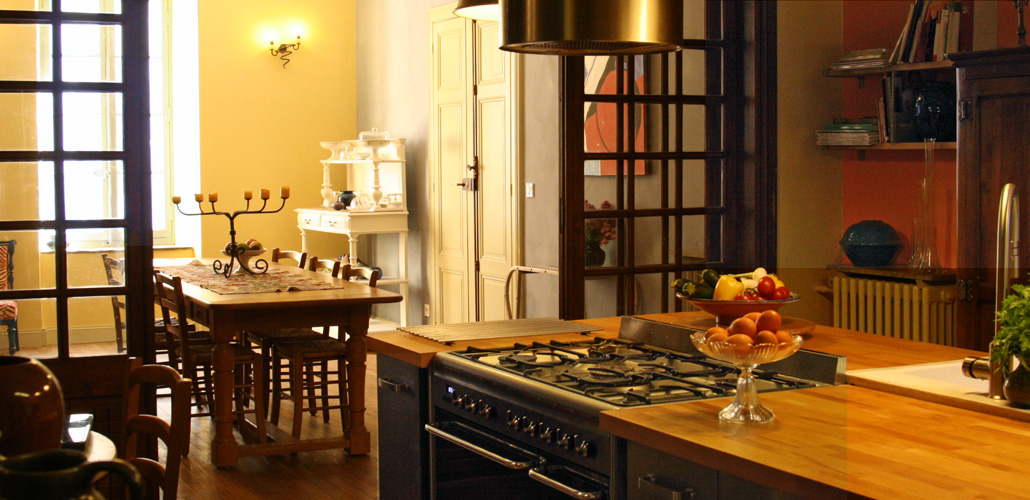 The dining room opens on the kitchen